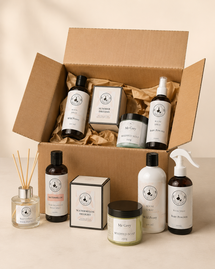 Assorted Little Brown Goose home fragrance and shower products with run-out box