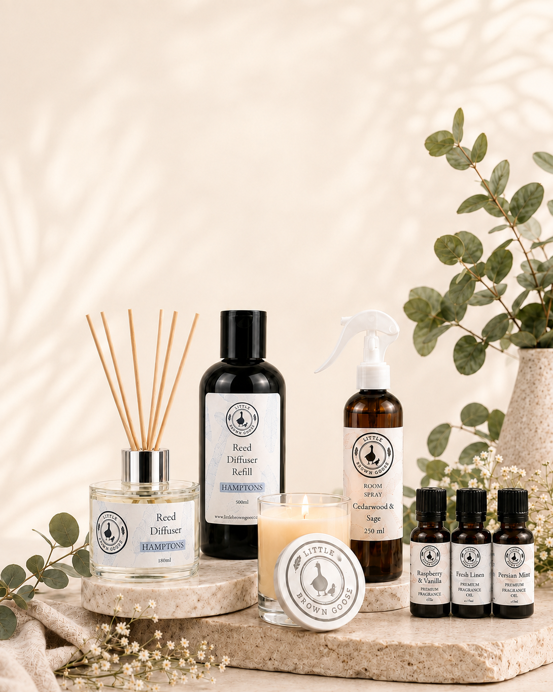 Little Brown Goose home fragrance products including reed diffuser, room spray, candle and fragrance oils
